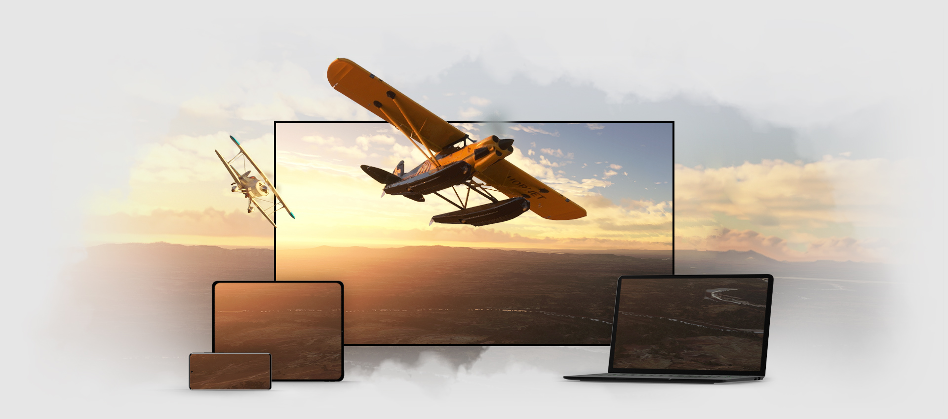 노트북, TV, 휴대폰, 태블릿 등 여러 장치의 화면에 Microsoft Flight Simulator의 게임 플레이가 나타납니다.